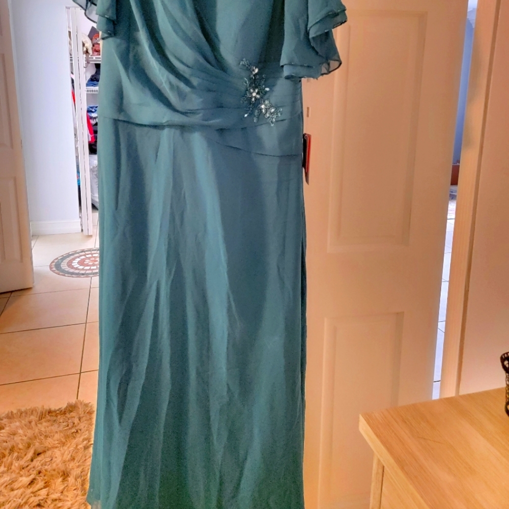 Beautiful elegant peacock green dress